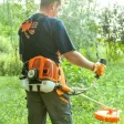 Motocoasă de tuns gazon/iarbă pe benzină Ruris DAC 310, putere 2.5 CP, motor TEZ, 2 timpi, diametru tăiere 20 cm, conține: bobină fir + disc 3 lame